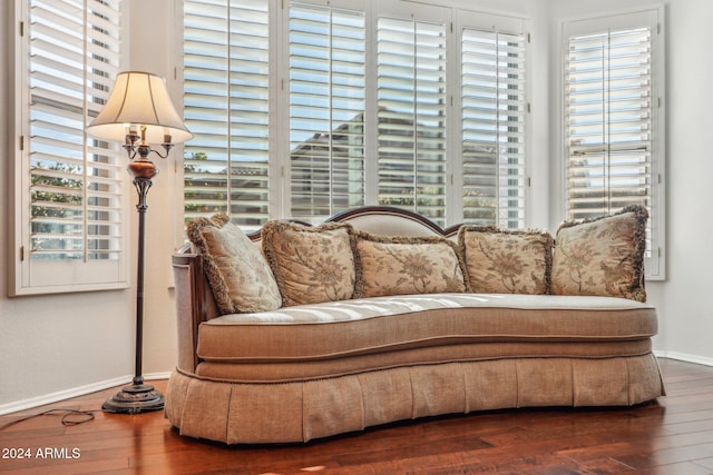 living area with hardwood / wood-style floors