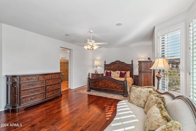 bedroom featuring hardwood / wood-style floors and ceiling fan