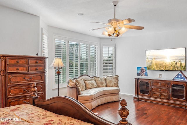 bedroom featuring ceiling fan and dark hardwood / wood-style flooring