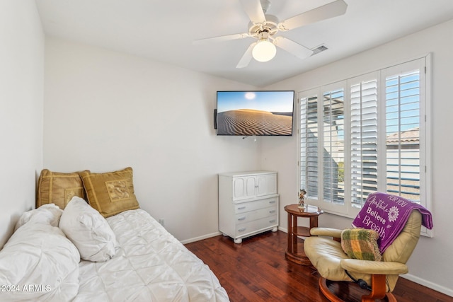 bedroom with ceiling fan and dark hardwood / wood-style flooring