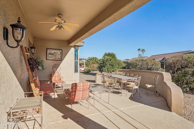 view of patio / terrace featuring ceiling fan