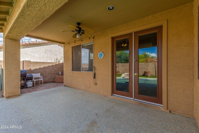 view of patio / terrace featuring french doors and ceiling fan