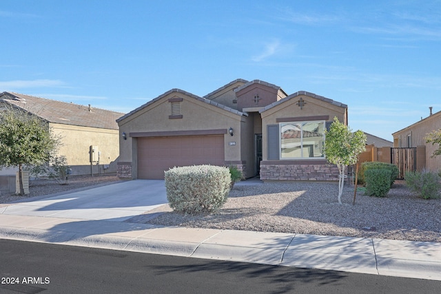 view of front of property with a garage