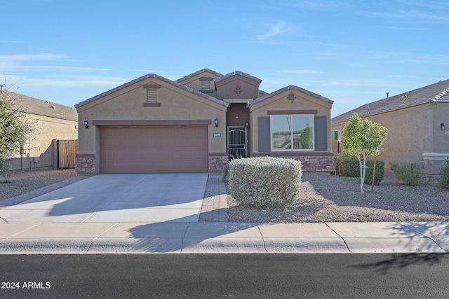 view of front of home with a garage