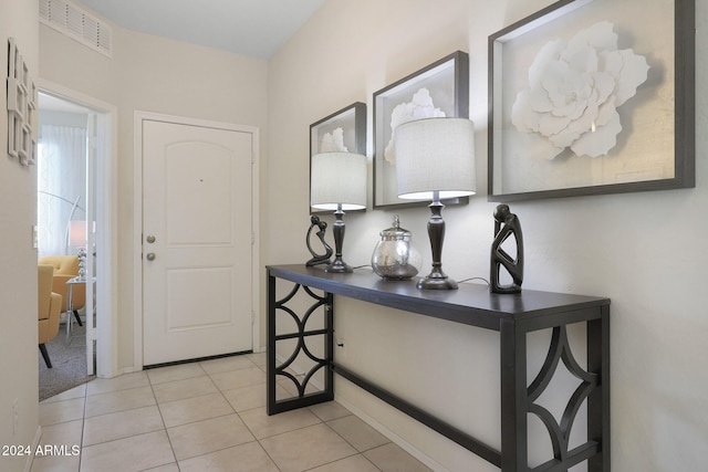 view of tiled foyer entrance