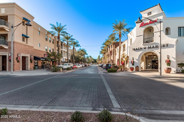 21186 W Hillcrest Blvd, Buckeye, AZ 85396 - view of street featuring curbs, street lighting, and sidewalks