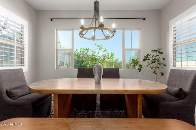 21186 W Hillcrest Blvd, Buckeye, AZ 85396 - dining space featuring a chandelier