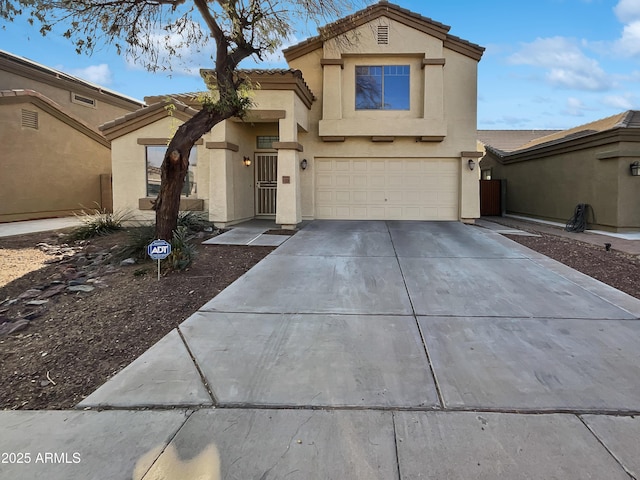 view of front of property featuring a garage