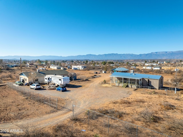 drone / aerial view featuring a mountain view