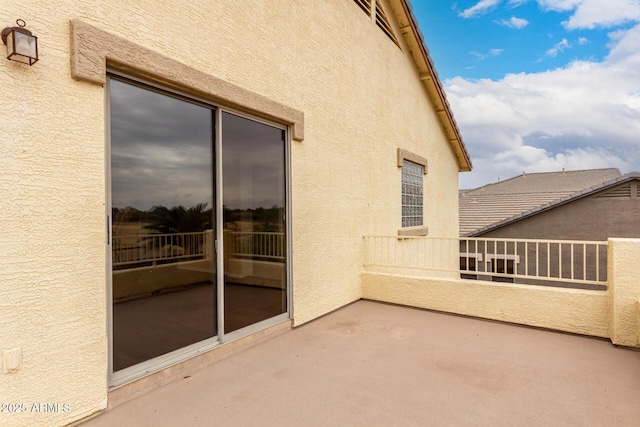 view of patio / terrace with a balcony