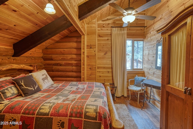 bedroom featuring rustic walls, wood ceiling, ceiling fan, hardwood / wood-style floors, and vaulted ceiling with beams