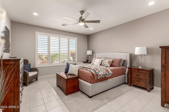 bedroom with light tile patterned floors and ceiling fan