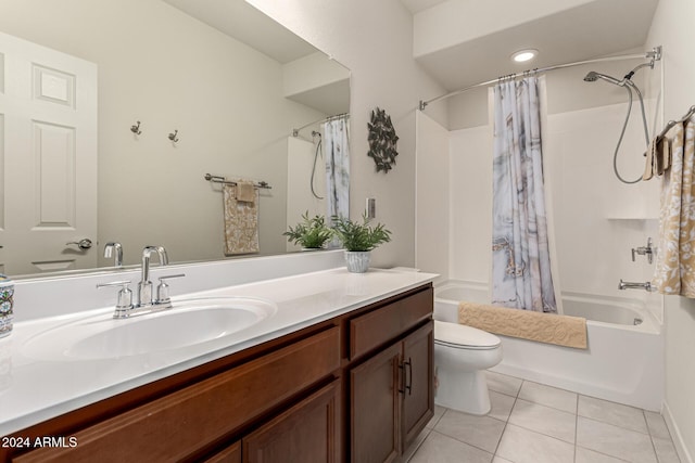 full bathroom featuring toilet, shower / bath combo, vanity, and tile patterned floors