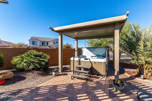 view of patio featuring a hot tub