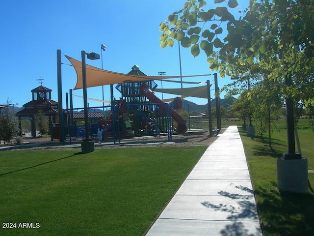 view of play area with a gazebo and a lawn