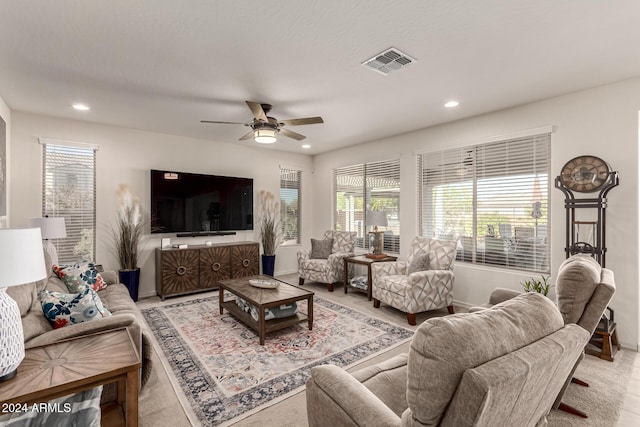 living room featuring ceiling fan