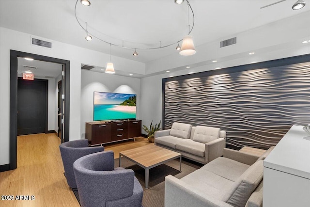 living room with light hardwood / wood-style floors