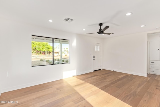 foyer with baseboards, a ceiling fan, recessed lighting, and visible vents