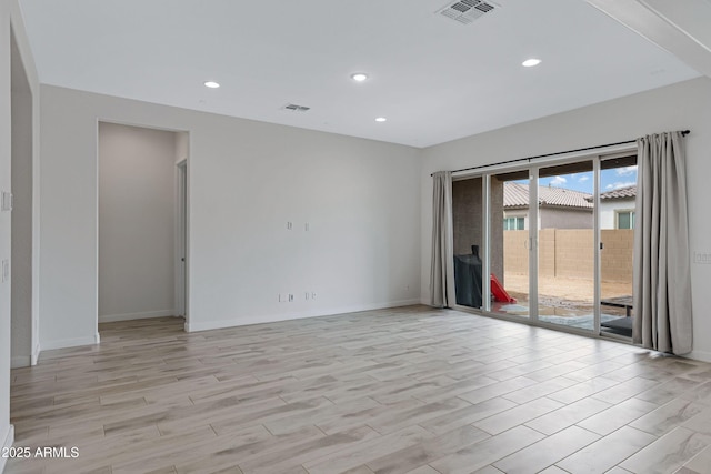 2968 E Tundra Ln, San Tan Valley, AZ 85143 - unfurnished room with visible vents, recessed lighting, and light wood-type flooring