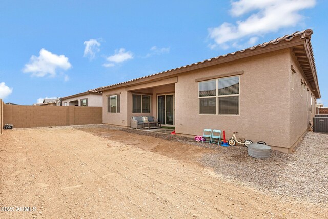2968 E Tundra Ln, San Tan Valley, AZ 85143 - rear view of property with central AC, a fenced backyard, a patio, and stucco siding