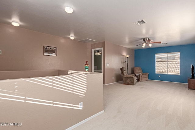 interior space featuring ceiling fan