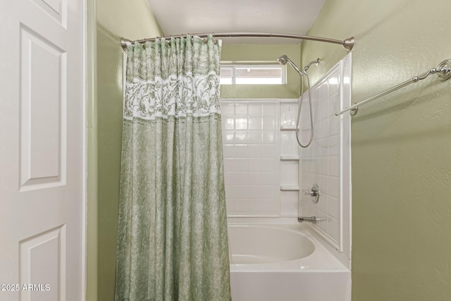 bathroom featuring shower / bath combination with curtain