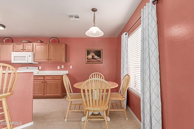 view of tiled dining room