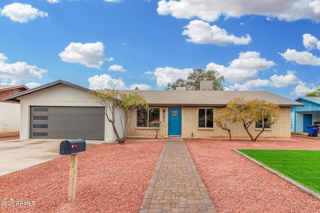 single story home with a garage