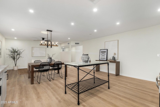 interior space featuring light hardwood / wood-style floors and ceiling fan