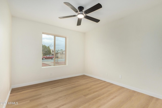 unfurnished room with ceiling fan and light hardwood / wood-style floors