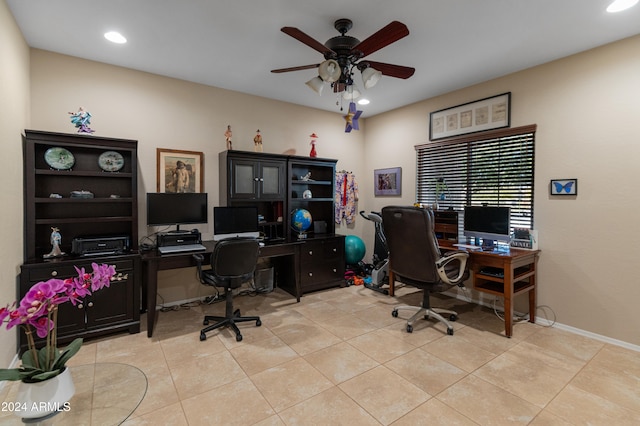 office space featuring ceiling fan and light tile patterned floors