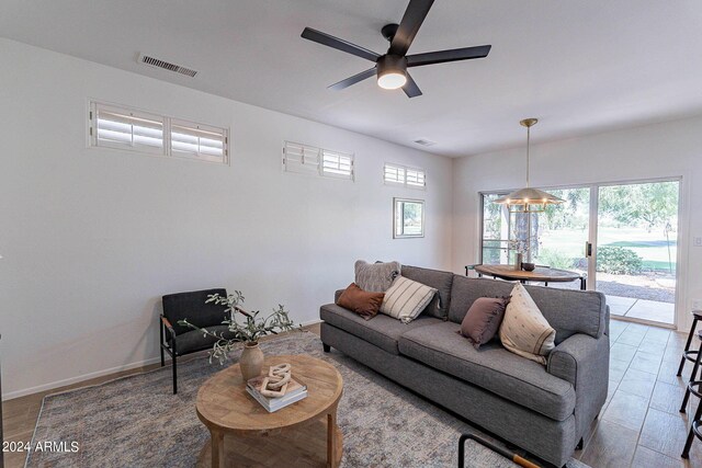 living room with ceiling fan