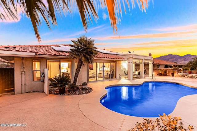 view of pool featuring a patio area and a fenced in pool