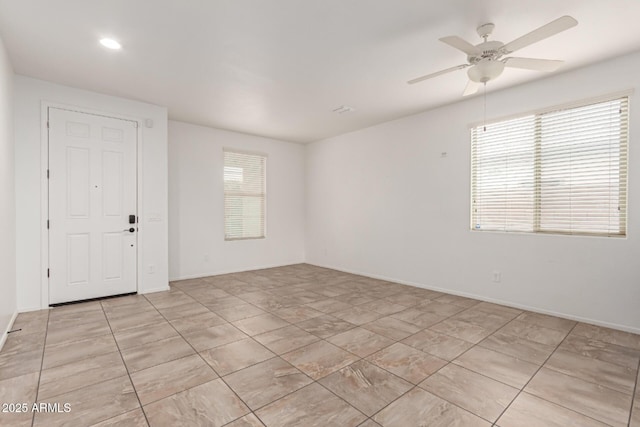 16789 W Moreland St, Goodyear, AZ 85338 - empty room featuring recessed lighting, baseboards, and a ceiling fan