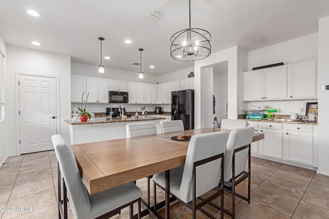 16789 W Moreland St, Goodyear, AZ 85338 - dining room with visible vents, recessed lighting, a notable chandelier, and light tile patterned floors