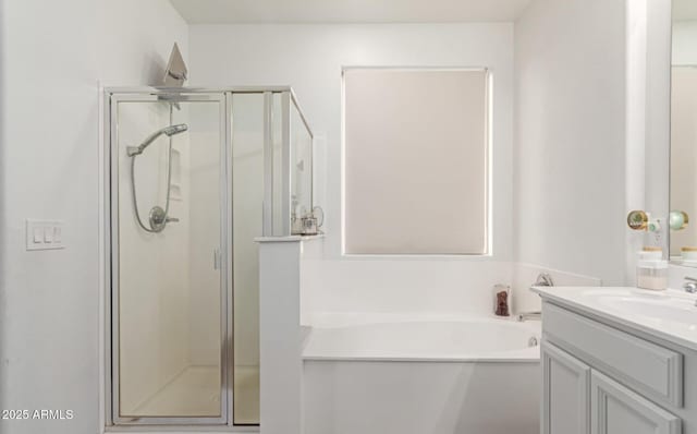 16789 W Moreland St, Goodyear, AZ 85338 - full bathroom featuring a bath, a shower stall, and vanity