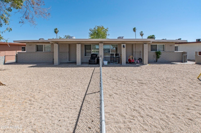 back of property featuring a patio area