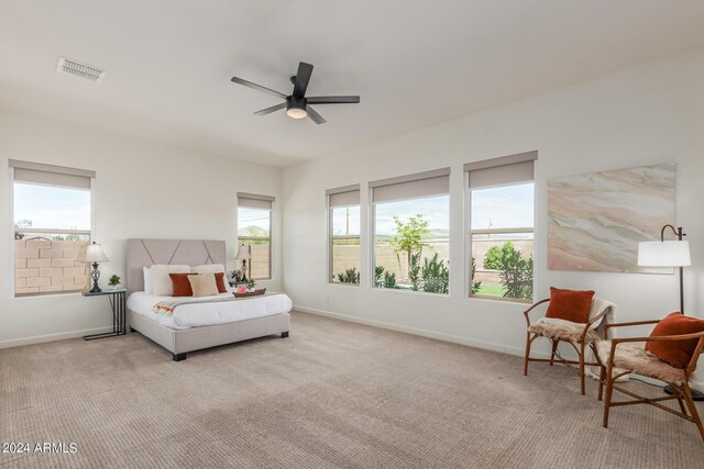 living room with light hardwood / wood-style flooring and ceiling fan