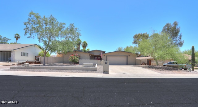 511 E Port Au Prince Ln, Phoenix, AZ 85022 - ranch-style house with an attached garage, concrete driveway, fence, and stucco siding