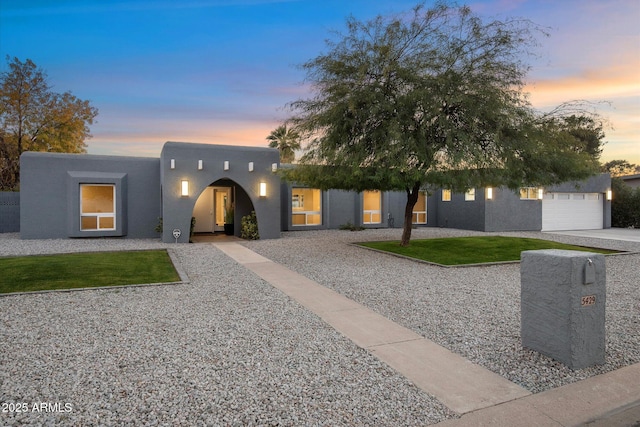 view of front of home with a garage