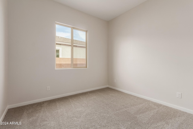 unfurnished room with carpet floors