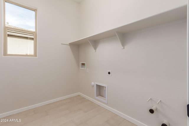 laundry area featuring hookup for an electric dryer, washer hookup, and gas dryer hookup