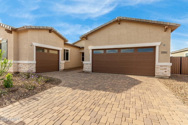 view of front of home with a garage