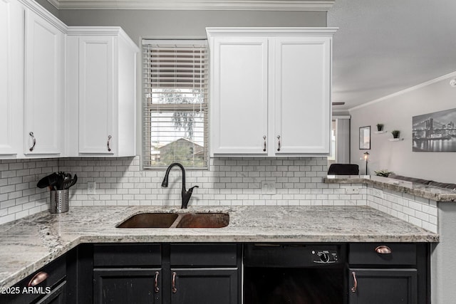 29606 N Tatum Blvd Unit 245, Cave Creek, AZ 85331 - kitchen with a sink, black dishwasher, crown molding, white cabinetry, and backsplash