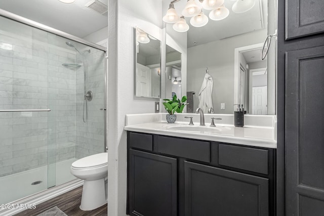 29606 N Tatum Blvd Unit 245, Cave Creek, AZ 85331 - full bath featuring toilet, a stall shower, vanity, and wood finished floors