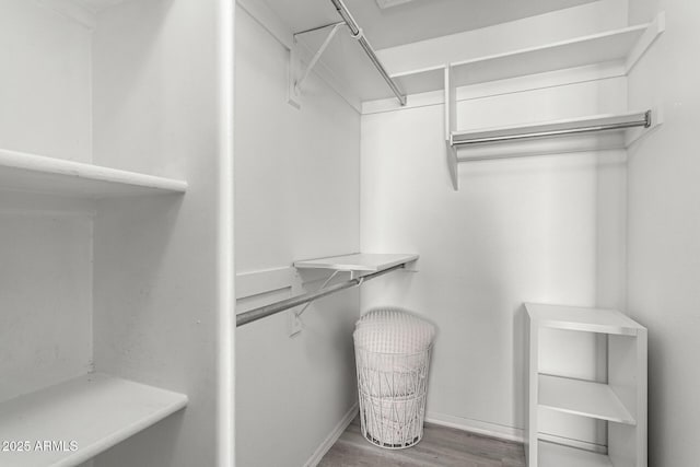 29606 N Tatum Blvd Unit 245, Cave Creek, AZ 85331 - walk in closet with wood finished floors