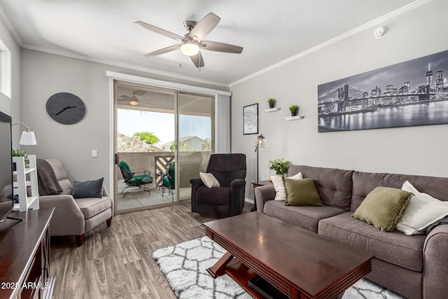 29606 N Tatum Blvd Unit 245, Cave Creek, AZ 85331 - living area with wood finished floors, crown molding, and a ceiling fan
