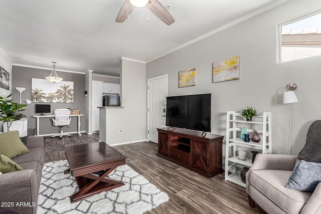 29606 N Tatum Blvd Unit 245, Cave Creek, AZ 85331 - living area featuring ornamental molding, a ceiling fan, dark wood-type flooring, a desk, and baseboards