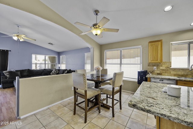 7832 E Osage Ave, Mesa, AZ 85212 - dining area with recessed lighting, light tile patterned floors, a ceiling fan, baseboards, and lofted ceiling