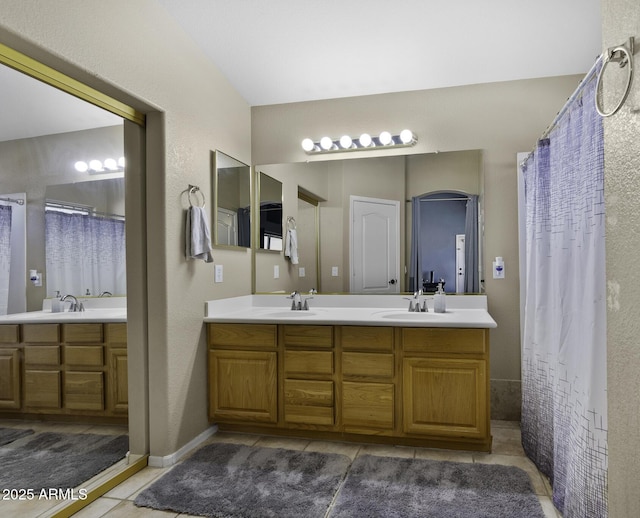 7832 E Osage Ave, Mesa, AZ 85212 - full bathroom featuring tile patterned floors, lofted ceiling, double vanity, and a sink